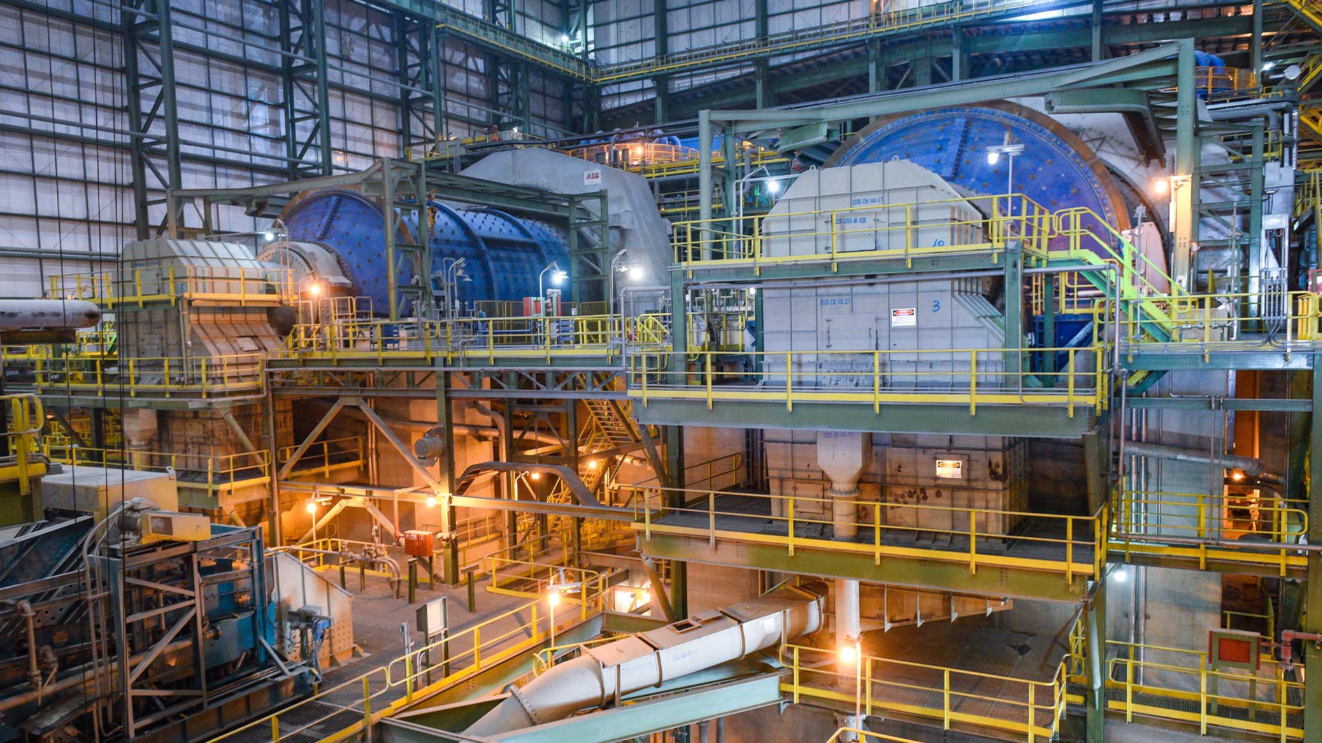 Multi-level view of large blue sulphide concentrators inside facilities. 